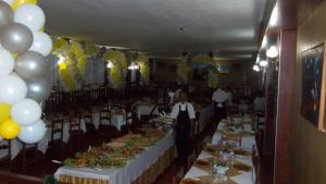 A restaurant or other place to eat at Hotel Miguel Pereira