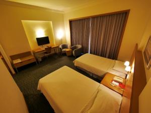 Postel nebo postele na pokoji v ubytování Premier Hotel + 20 fotografií