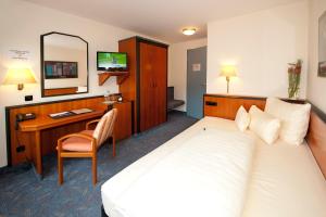 Postel nebo postele na pokoji v ubytování Advantage Appartements Hotel