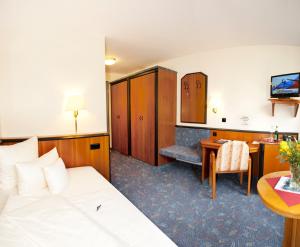 Postel nebo postele na pokoji v ubytování Advantage Appartements Hotel