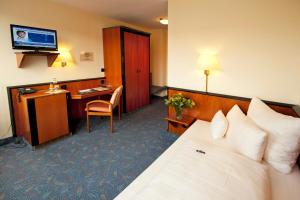 TV a/nebo společenská místnost v ubytování Advantage Appartements Hotel