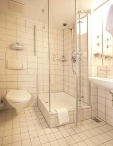 Koupelna v ubytování Advantage Appartements Hotel + 22 fotografií