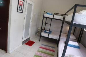 Postel nebo postele na pokoji v ubytování Long Hostel