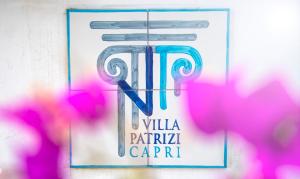 a sign for a villa parilla carrián at Villa Patrizi in Capri