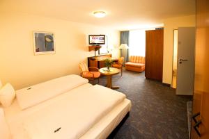 Postel nebo postele na pokoji v ubytování Advantage Appartements Hotel