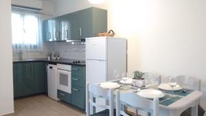 Kuchyň nebo kuchyňský kout v ubytování Dimitra Apartment
