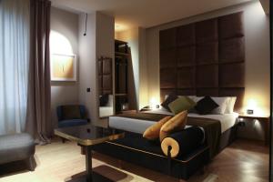 Voodi või voodid majutusasutuse Triviho Hotel toas