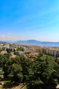 a view of a city with trees and buildings at nice in Nice