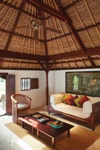 Postel nebo postele na pokoji v ubytování Jimbaran Puri, A Belmond Hotel, Bali