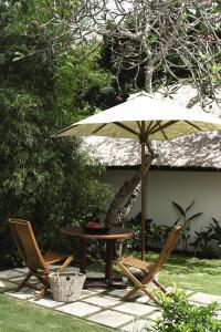 Zahrada ubytování Jimbaran Puri, A Belmond Hotel, Bali