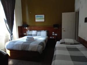 Cama o camas de una habitación en Glasgow House