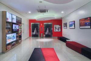 TV in/ali zabaviščno središče v nastanitvi Red Planet Ortigas