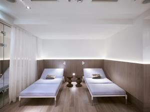 Letto o letti in una camera di Hotel Sans Souci Wien