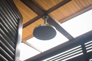 a pot hanging from the ceiling of a roof at Idyllic Concept Resort in Ko Lipe