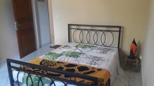 Postel nebo postele na pokoji v ubytování lakazadom974 - Chambres d'Hôtes