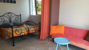 Postel nebo postele na pokoji v ubytování lakazadom974 - Chambres d'Hôtes