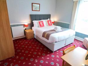 Ένα ή περισσότερα κρεβάτια σε δωμάτιο στο The Great Western B&B