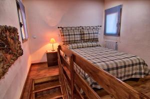 A bed or beds in a room at La Illeta Még 21 kép