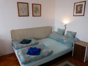 Giường trong phòng chung tại Óbuda Apartments