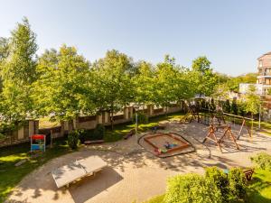 an aerial view of a playground in a park at M&M Apartamenty in Kołobrzeg
