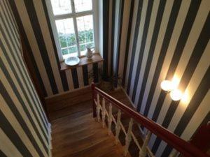 a staircase in a house with a window at Traumparadies in Bad Sulza