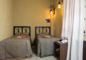 Uma cama ou camas num quarto em Tufenkian Old Dilijan Complex