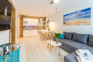 Et tv og/eller underholdning på 3L Apartments Bliżej Morza