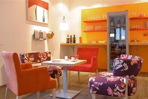 Ruang duduk di Spiele- und Buchhotel Tschitscher