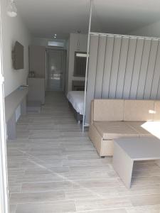 Cama ou camas em um quarto em Thassos Imperial Resort