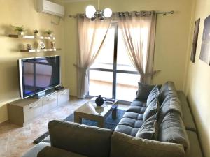 Ruang duduk di EKA Luxury One-Bedroom Apartment