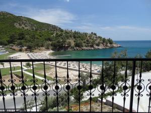 a view of a beach from a balcony at Thassos Grand Resort in Alyki
