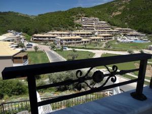 a balcony with a view of a resort at Thassos Grand Resort in Alyki