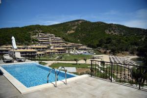 a view of a resort with a swimming pool at Thassos Grand Resort in Alyki