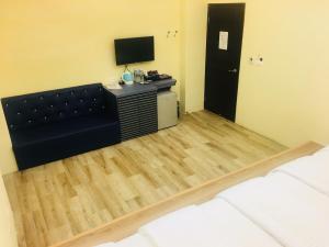 Letto o letti in una camera di Tiamo B&B