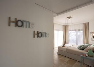 A bed or beds in a room at Romantic Relais Sorrento