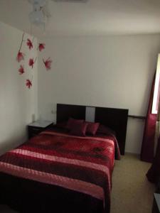 Una cama o camas en una habitación de Mi pequeño apartamento