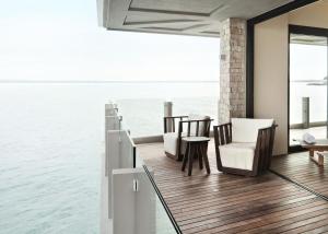 a room with a view of the water at Grand Hotel Terme Sirmione in Sirmione