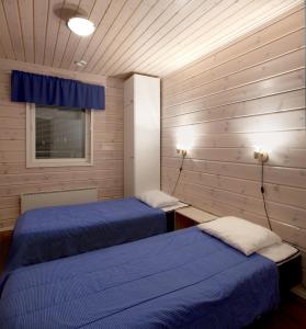 Een bed of bedden in een kamer bij Himosport Apartments