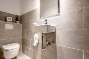 Kúpeľňa v ubytovaní Townhouse Can Butxaca By homevillas360