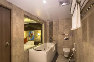 Koupelna v ubytování Bodhi Suites Boutique Hotel and Spa