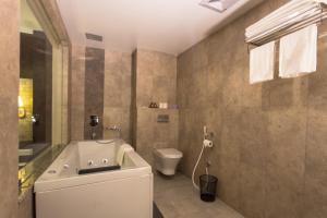 Koupelna v ubytování Bodhi Suites Boutique Hotel and Spa