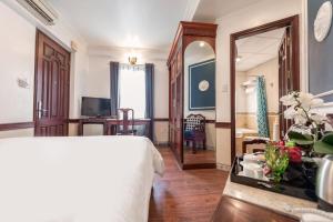 TV a/nebo společenská místnost v ubytování Prince II Hotel