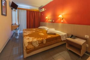 Postel nebo postele na pokoji v ubytování Dimitris Paritsa Hotel + 18 fotografií