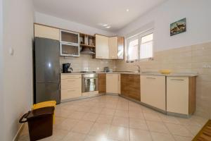 Kuchyň nebo kuchyňský kout v ubytování Apartmani Marica Beg