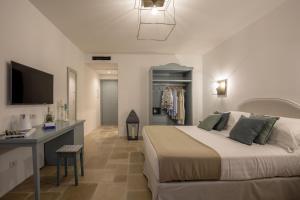 Giường trong phòng chung tại Romantic Relais Sorrento