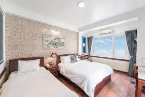 Postel nebo postele na pokoji v ubytování Prince II Hotel + 37 fotografií