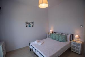 Posteľ alebo postele v izbe v ubytovaní Villa Villekula