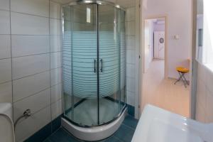 Kúpeľňa v ubytovaní Villa Villekula