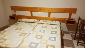 Hostal Arenal客房内的一张或多张床位