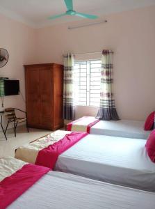 Cama o camas de una habitación en Lung Ho motel